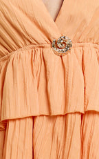 Heidi Mini Dress - Deep V Plunge Halter Neck Peplum Brooch Detail Fit And Flare Dress in Orange